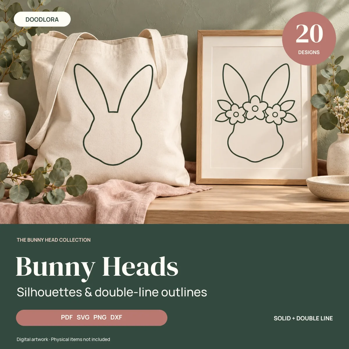 A canvas tote bag printed with a plain bunny head outline beside a framed print of a bunny head wearing a flower crown