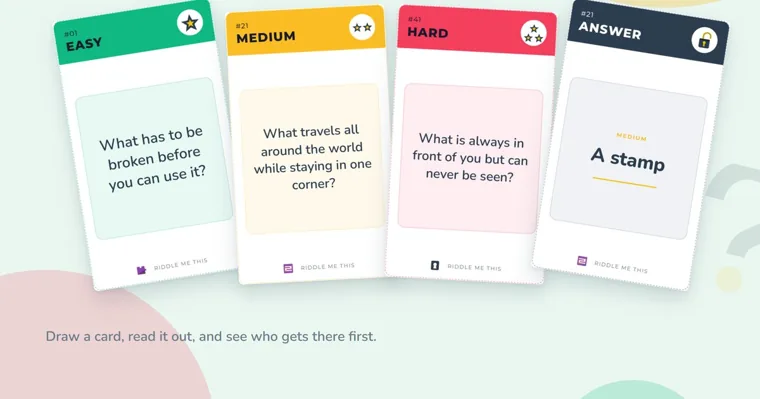 Four riddle cards in a row, a green Easy card, a yellow Medium card, a red Hard card and a dark answer card reading A stamp